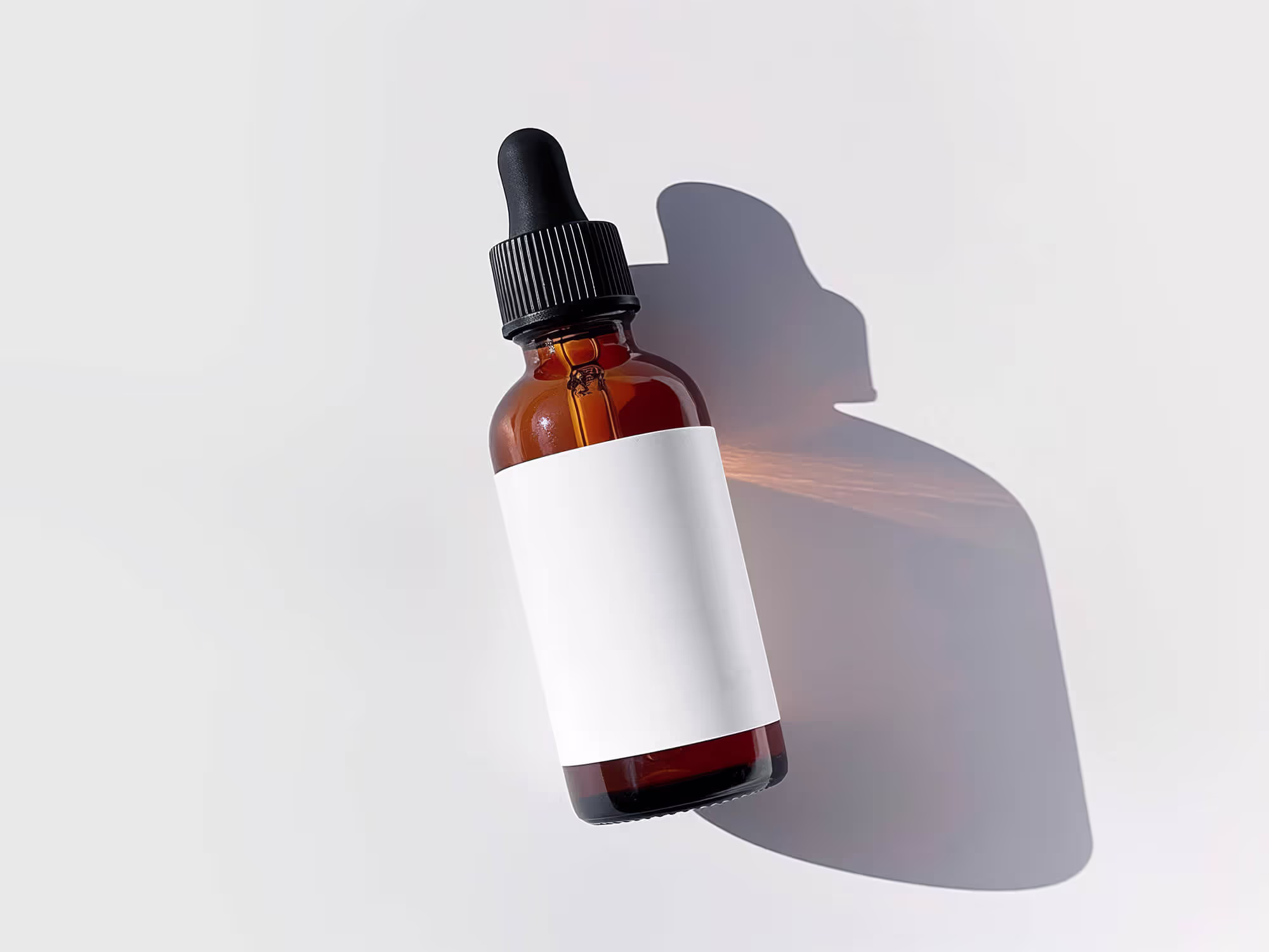 Free Glass Dropper Bottle Mockup | Full Resolution File